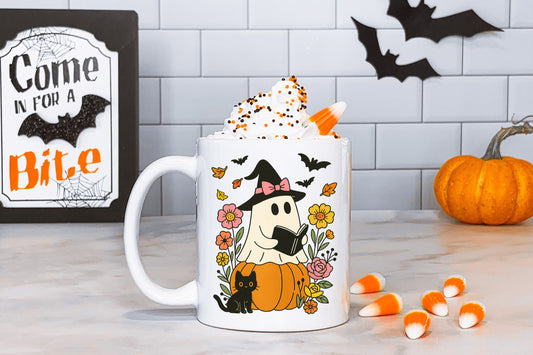 Ghosty reading on a pumpkin Tasse
